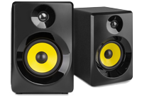 Two black DJ monitor speakers with yellow speaker cones.