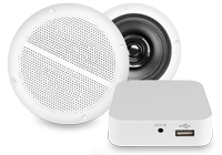 A smart home sound system including two ceiling speakers with white grilles and white multi room wifi amplifier.