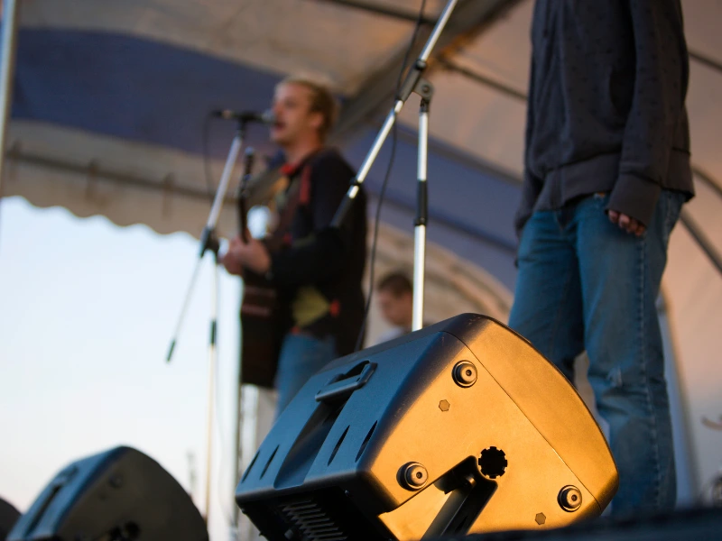 A Guide to Stage Monitor Speakers - Active Floor Monitor on a Stage