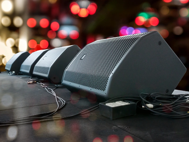 A Guide to Stage Monitor Speakers - Passive Wedge Monitor Speakers on a Stage